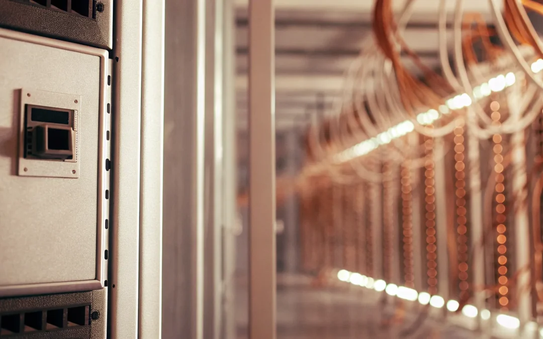 Secure fiber optic network cabling in server rack.