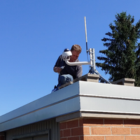 Umbrella Security Systems Chicago | Company Credentials & Expertise 35 Security infrastructure coordination on rooftop installation