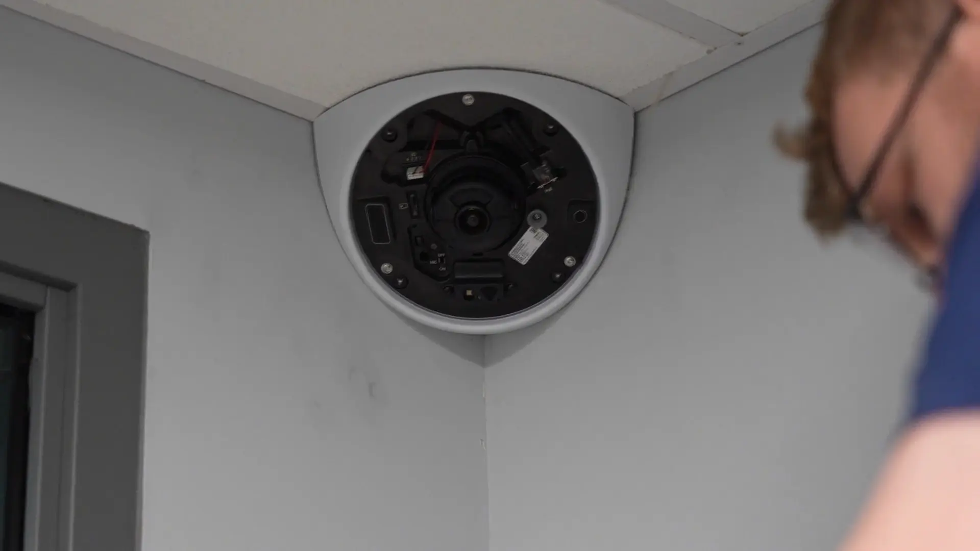 Wilmington Police and City Hall Security Modernization 10 Corner mount camera being installed in a Wilmington police interview room for clear recorded statements