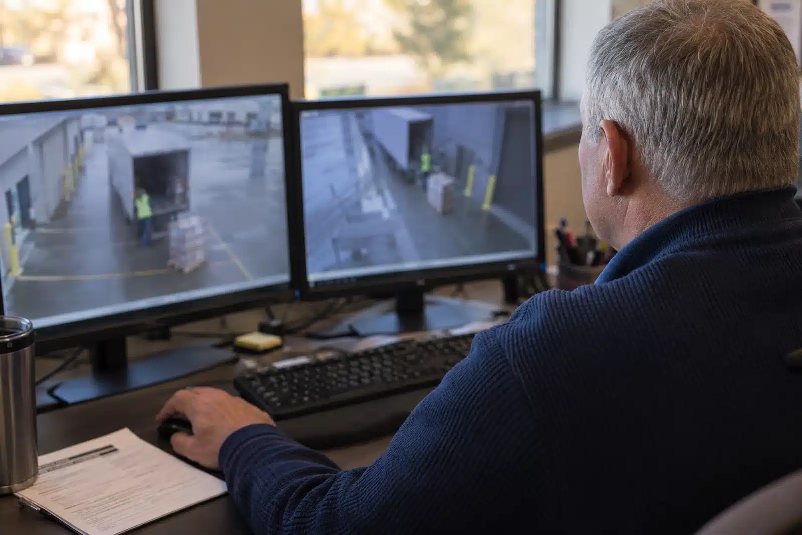 Milestone XProtect VMS Review: What We’ve Learned in the Field 4 Security investigator reviewing synchronized camera footage and preparing video evidence after an incident